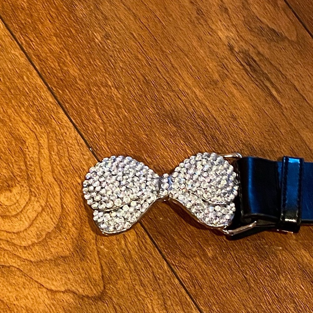 Black leather belt with rhinestone bow 46”